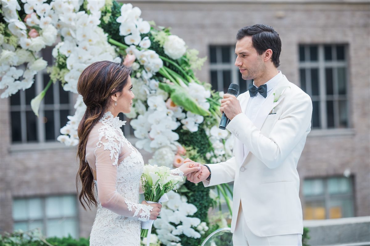 Vows beneath the orchid arch