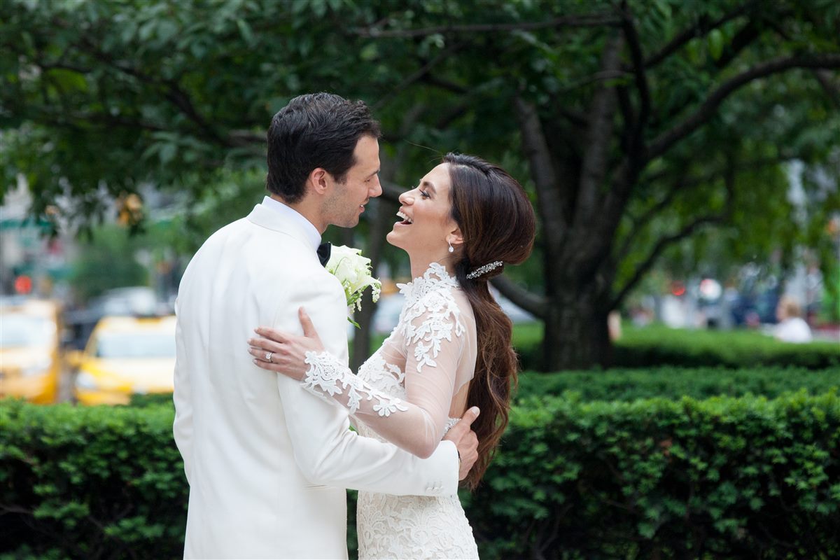 The couple beneath Park Avenue trees