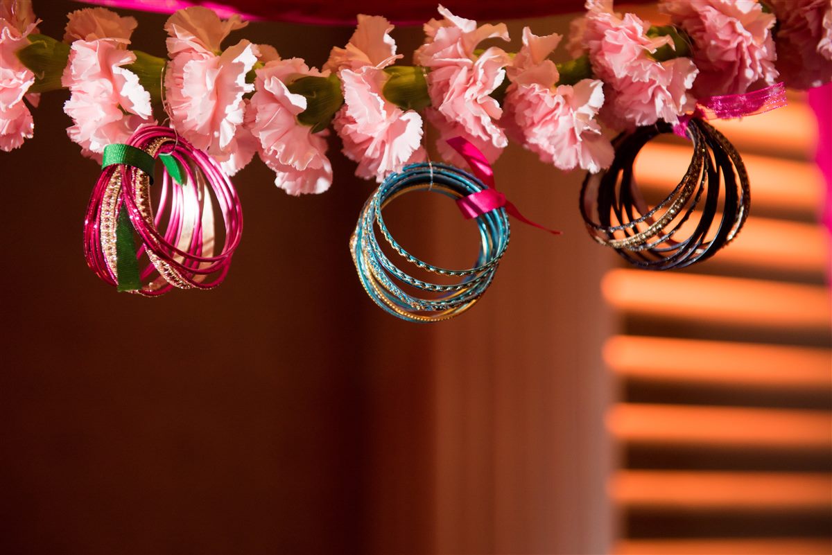 Bangles hung from pink blossoms