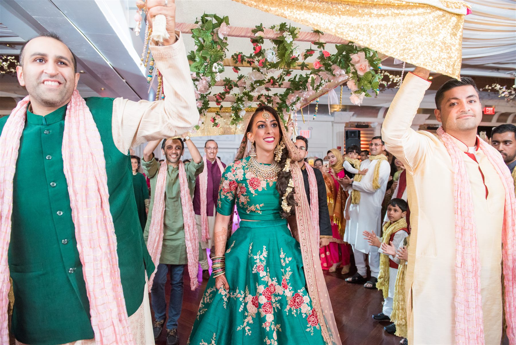 The bride arrives beneath the phulkari