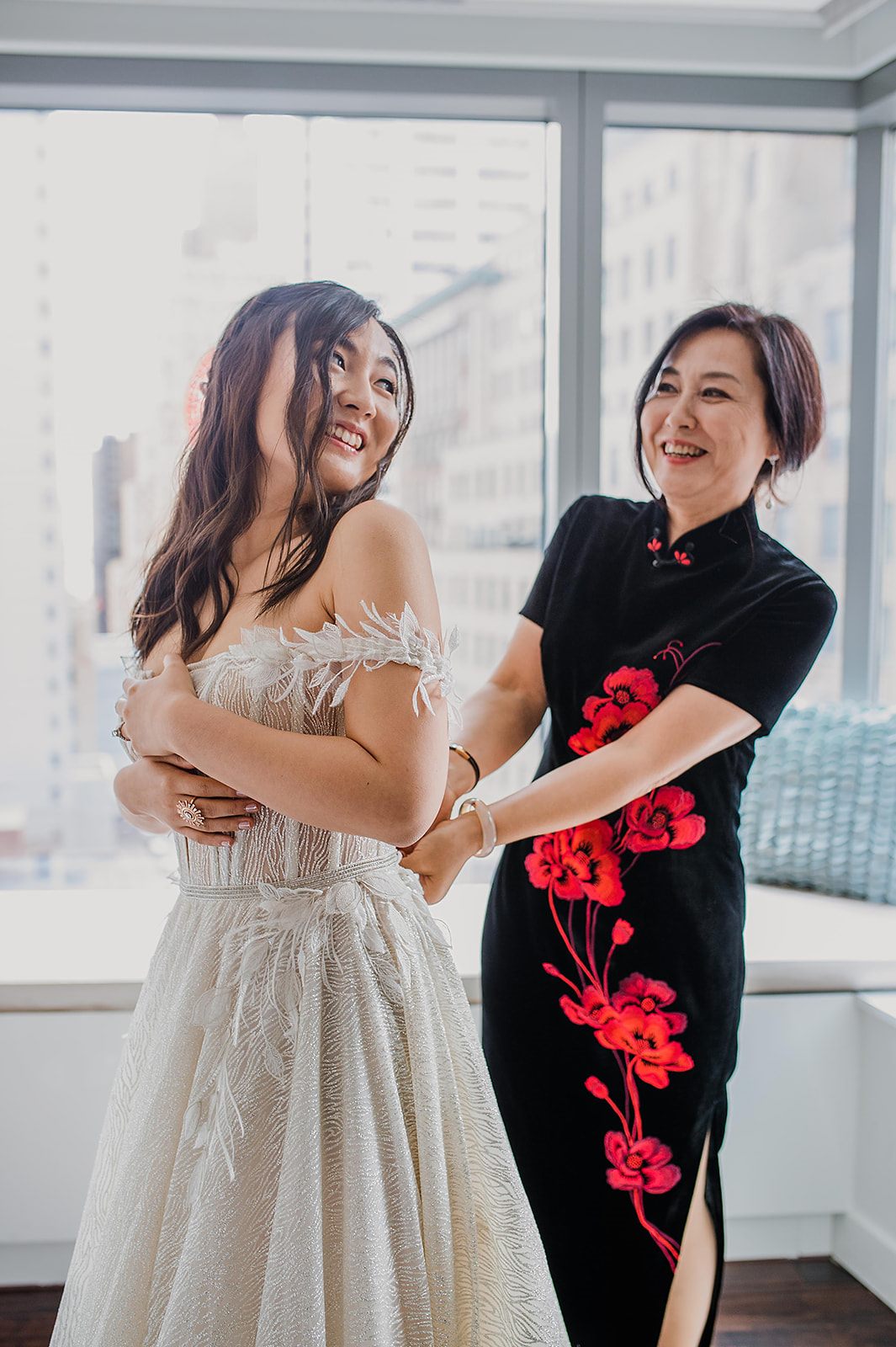 The bride and her mother, in qipao