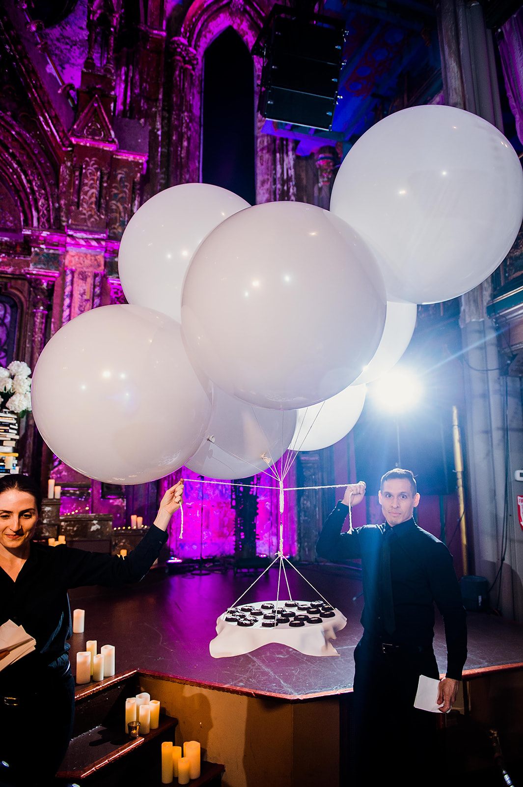 Balloons lifting the dessert display
