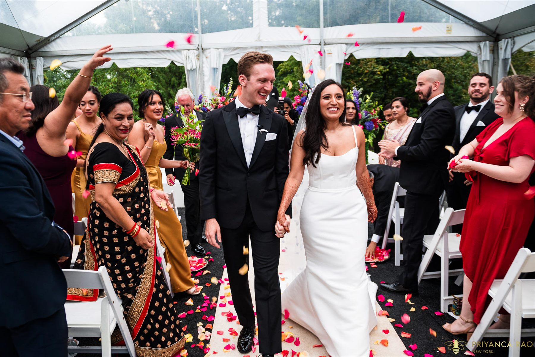 Up the aisle through the petals