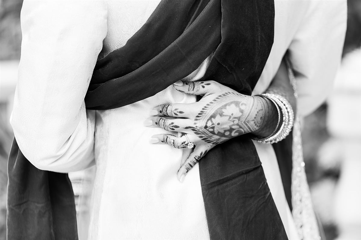 Mehndi at his back, in black and white