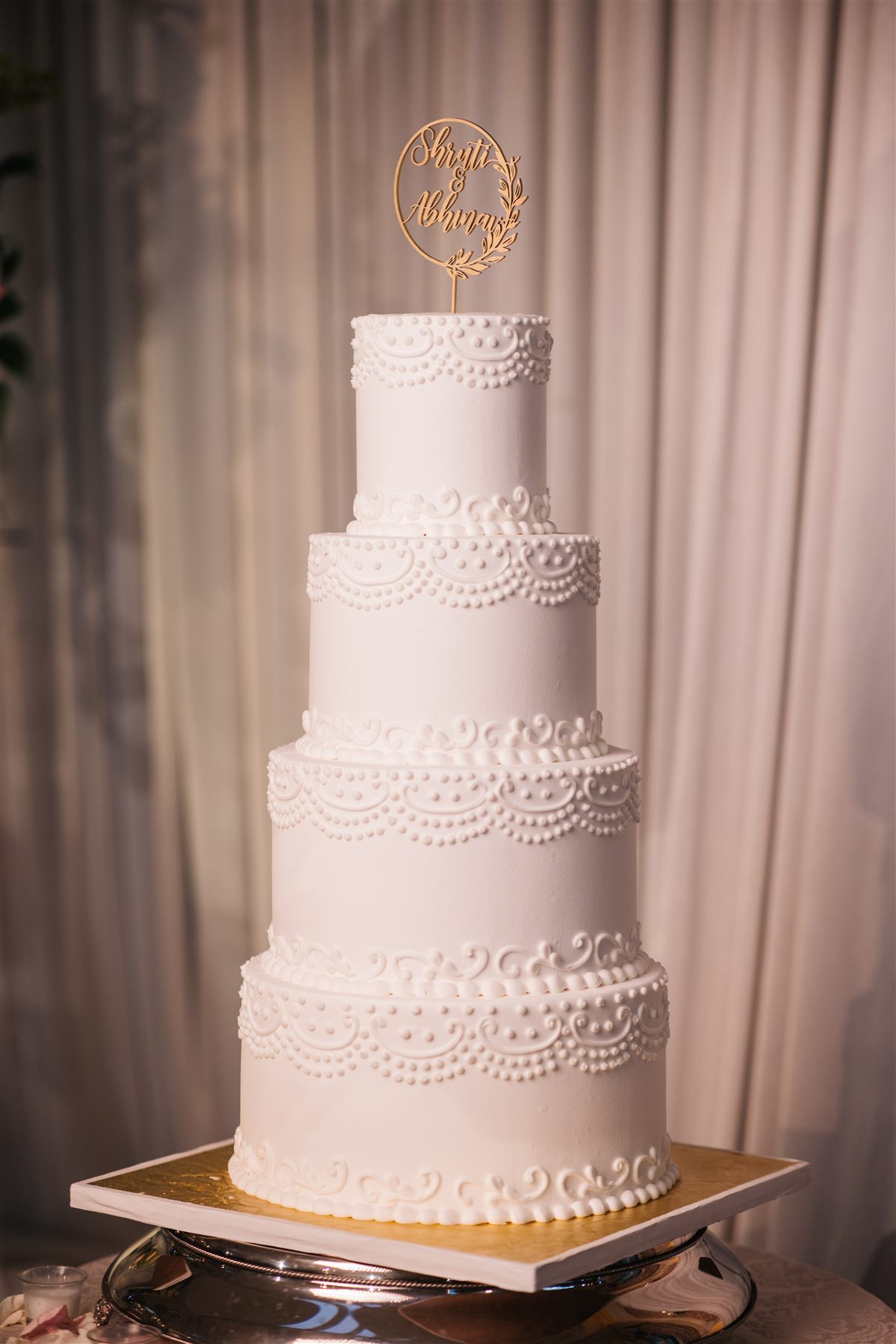 Five tiers of piped lace