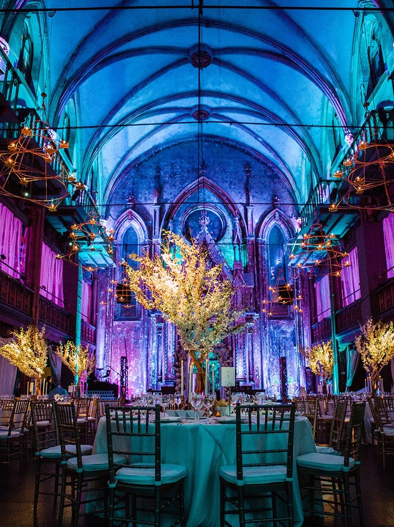 Amber trees over the tables, blue vaults above