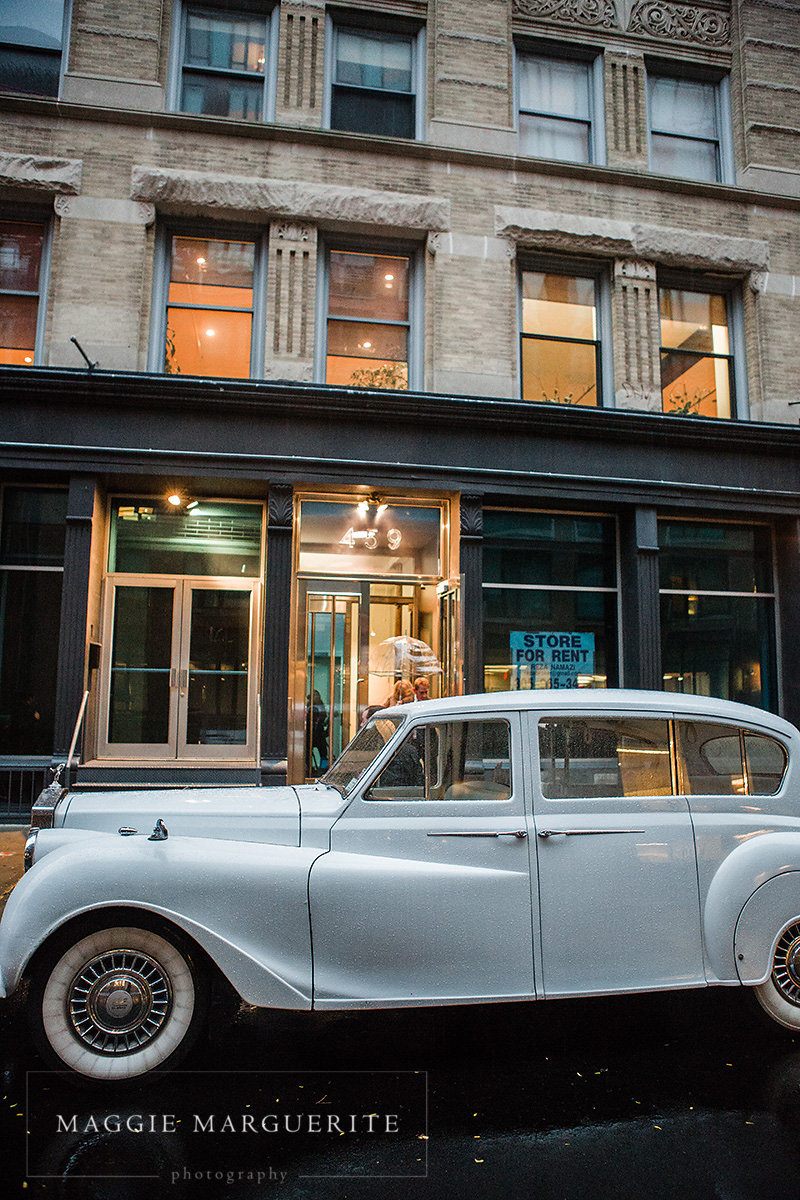 The vintage Rolls at the curb