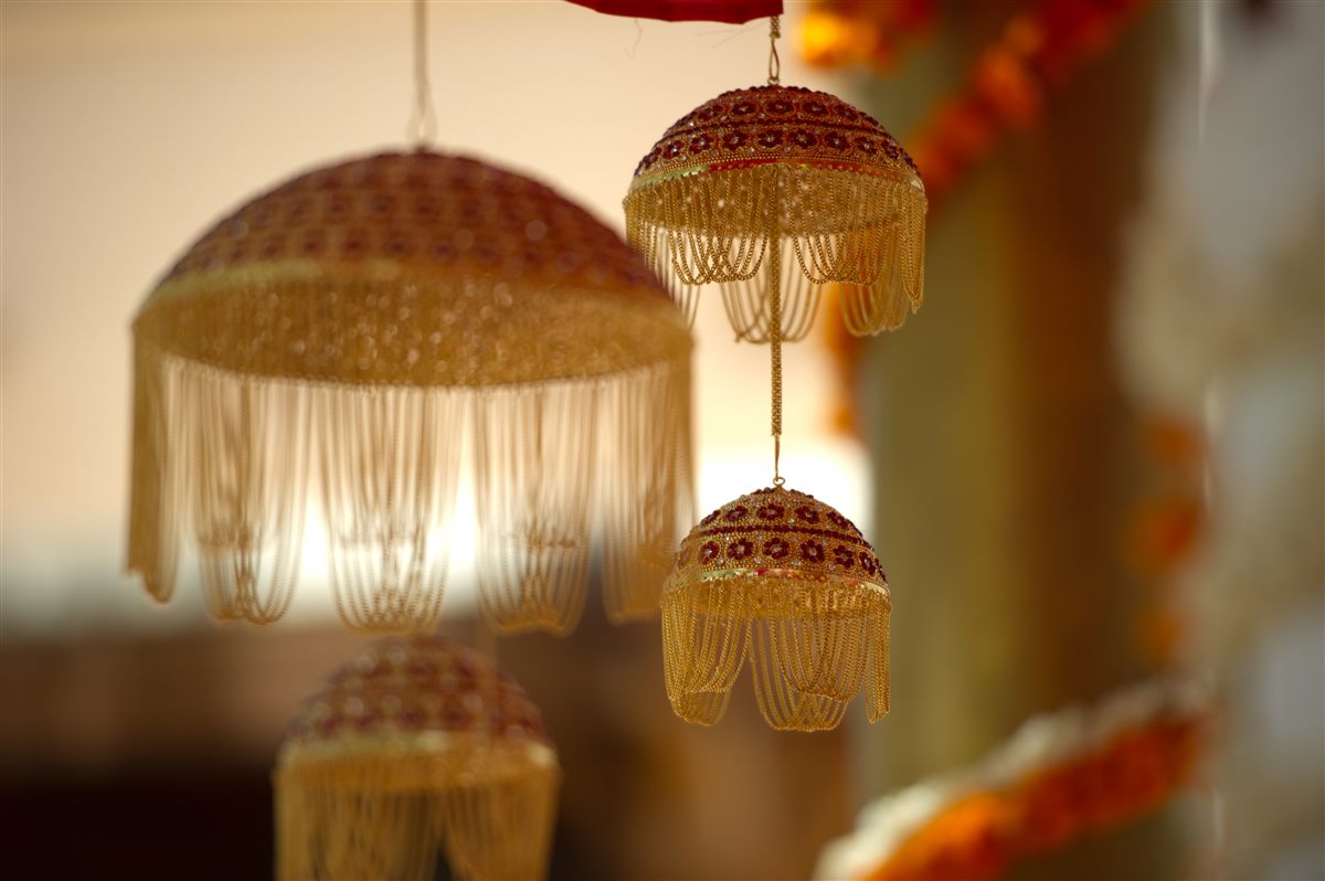 Fringed lanterns overhead