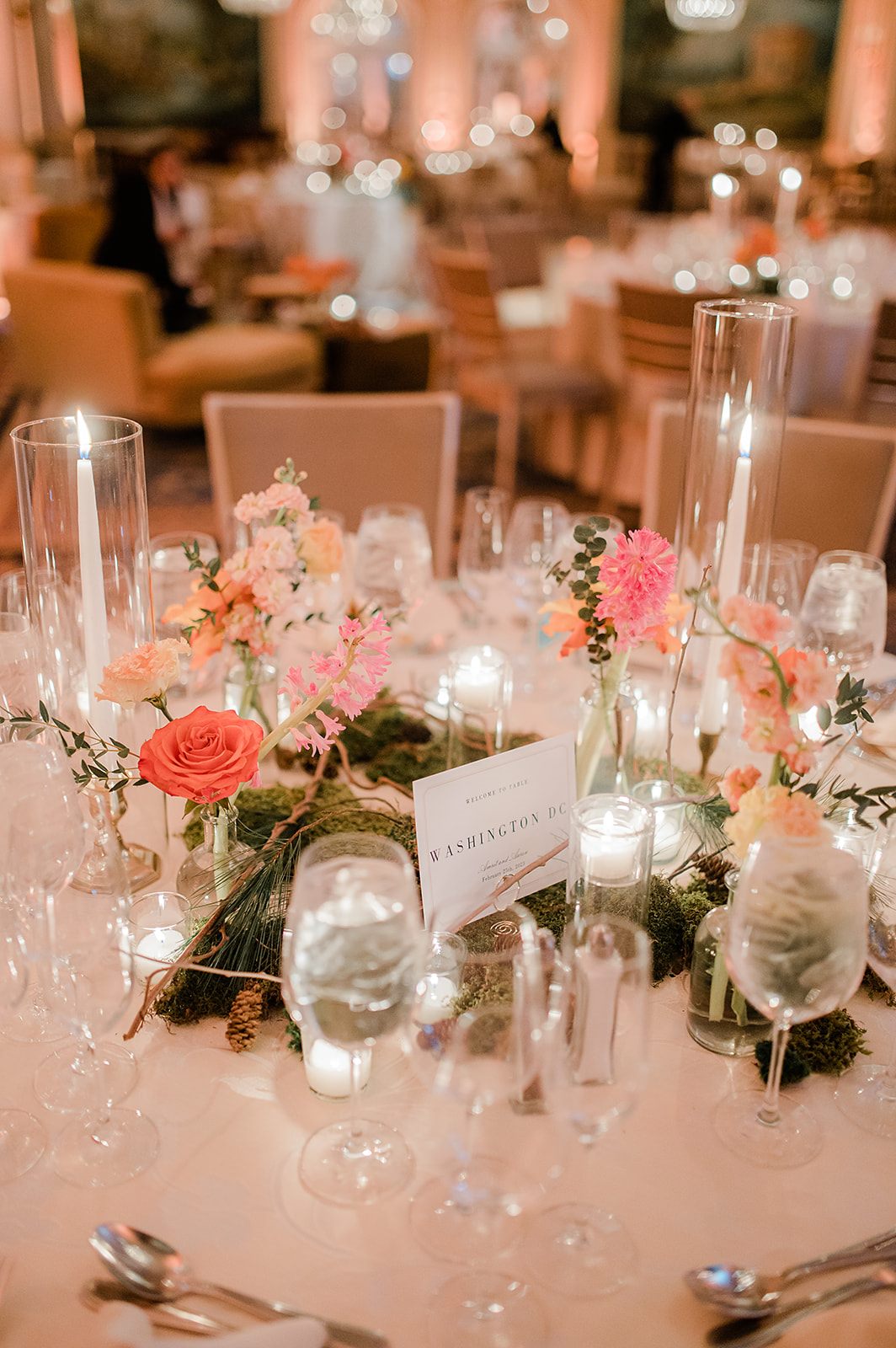 Coral roses down the table