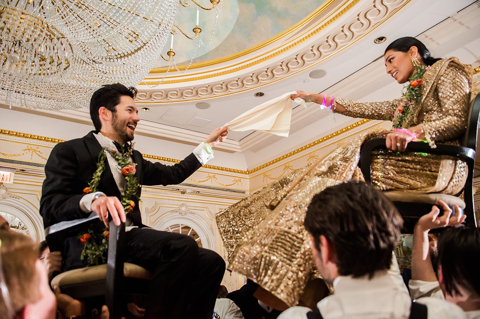 The hora, beneath the gilded ceiling