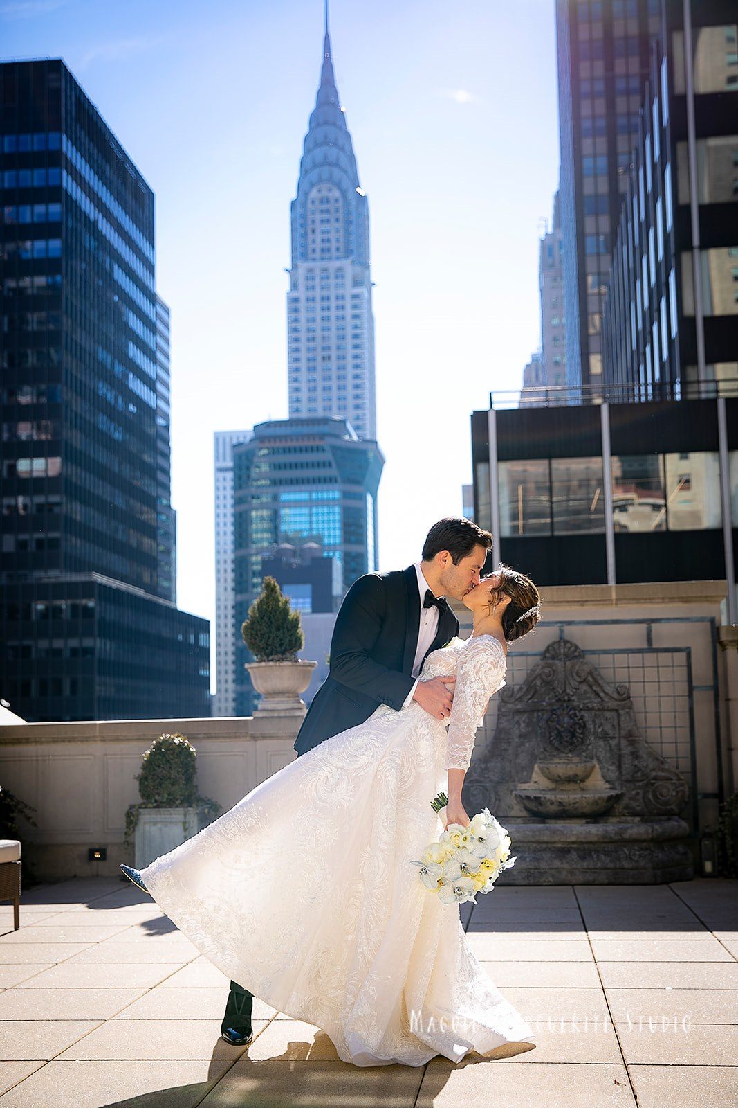 A kiss under the Chrysler